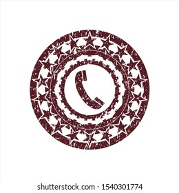 Red old phone icon inside distress rubber stamp