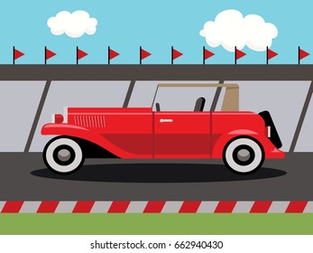 red old timer car on race track