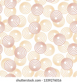 Red and orange concentric circles with dotted outline. Seamless geometric pattern on white background. Vector image