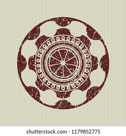 Red orange icon inside distress rubber stamp with grunge texture