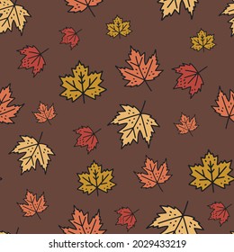 red, orange and mustard yellow autumn leaves seamless pattern over brown background print. Fall vector illustration. For kids, autumn parties or home decor projects. Surface pattern design.