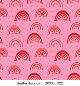 Red and Orange Rainbows on polka dots seamless pattern design. Girly design perfect for baby and kids fashion, fabric, accessories, wallpaper, scrapbooking, partyware