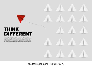 red origami paper airplane going out from group of white. Business Concept of disruption and vision mission.