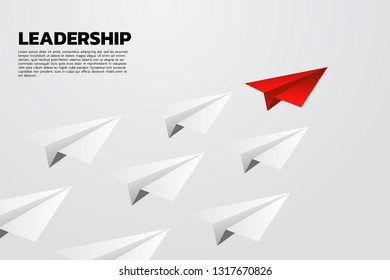 red origami paper airplane leading group of white. Business Concept of leadership and vision mission.