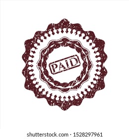 Red paid icon inside rubber texture