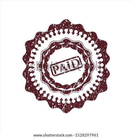Red paid icon inside rubber texture