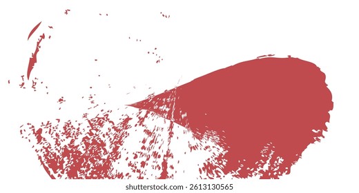 Red paint splatter on a white background, featuring a large, bold stroke on the right and scattered, smaller specks to the left