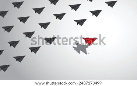 A red paper airplane with a fighter jet shadow changes course from a group of other paper airplanes, a concept of different business and social behaviors. Vector illustration.