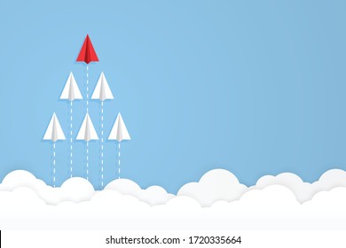 Red paper airplane flying in front on blue sky background. Different thinking concepts. Team leadership status. vector illustration in flat design. business and finance. copy space for text input.