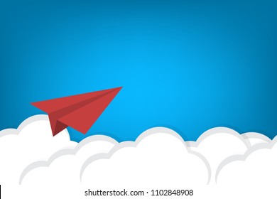 Red Paper Airplane Flying Over Clouds