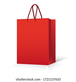 
red paper bag with handles, with shadow on a white background