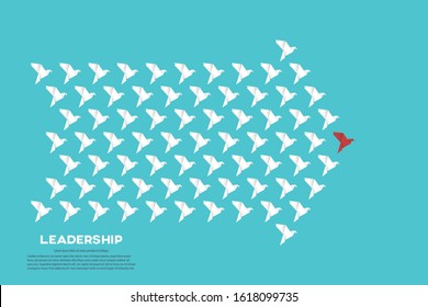 Red paper bird as a leader among others, leadership, teamwork, motivation, stand out of the crowd concept, EPS10 vector