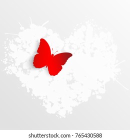 Red paper butterfly on a white heart. Wedding decoration. Template greeting card, blank floral wall decor. Background.