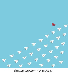 The red paper fly cross from white paper planes, think difference concept.