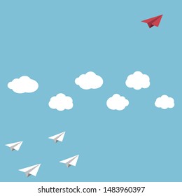 The red paper flying to the top of clouds, leader business concept.