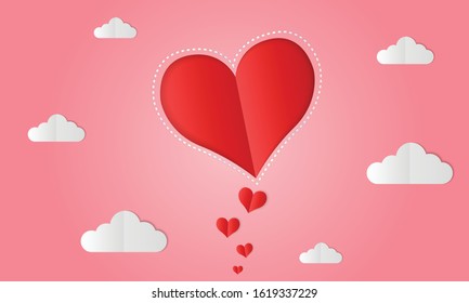 Red paper heart floating with clouds on pink background