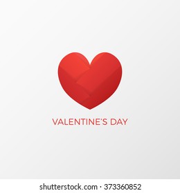 Red paper heart Valentines day card on white background. Heart logo design template. Heart symbol. Origami.