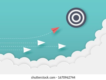 The red paper machine turned towards the target while the white paper plane flew straight.