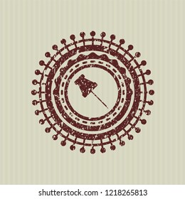 Red paper pin icon inside distressed grunge seal