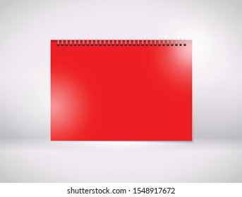 a red paper wiro bind 