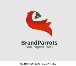 Red parrots fly with look back logo design inspiration