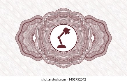 Red passport money rosette with desk lamp icon inside