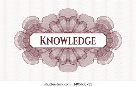 Red passport money rosette with text Knowledge inside