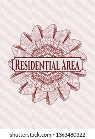 Red passport money style rosette with text Residential Area inside