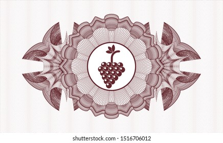 Red passport money style rosette with bunch of grapes icon inside