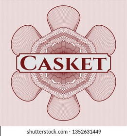 Red passport rosette with text Casket inside