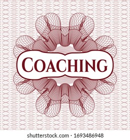 Red passport rosette with text Coaching inside