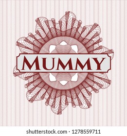Red passport rosette with text Mummy inside
