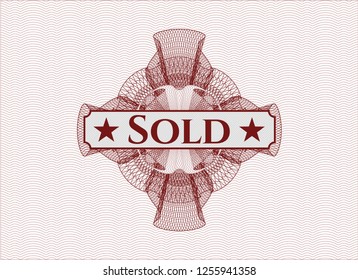 Red passport rosette with text Sold inside