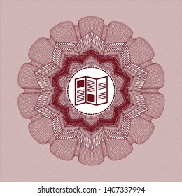 Red passport style rosette with brochure icon inside