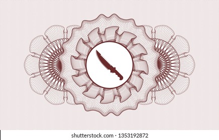 Red passport style rosette with combat knife icon inside