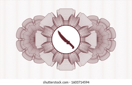 Red passport style rosette with combat knife icon inside