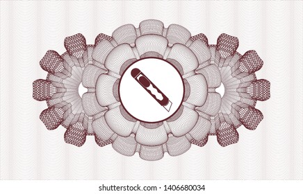 Red passport style rosette with cutter icon inside