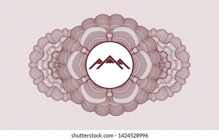 Red passport style rosette with mountain icon inside