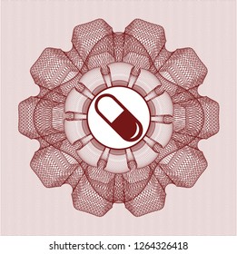 Red passport style rosette with pill icon inside