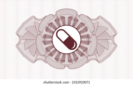 Red passport style rosette with pill icon inside