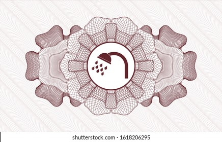 Red passport style rosette with shower icon inside