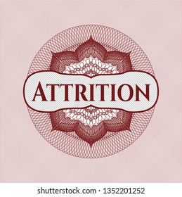 Red passport style rosette with text Attrition inside
