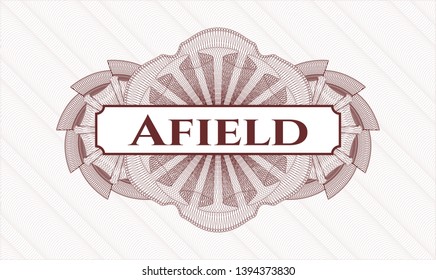Red passport style rosette with text Afield inside