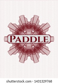 Red passport style rosette with text Paddle inside