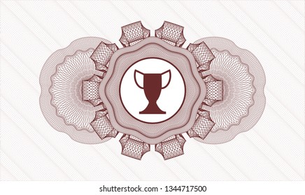 Red passport style rosette with trophy icon inside
