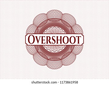 Red passport style rossete with text Overshoot inside