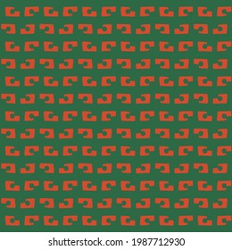 Red patches, a kind of broken links, on a green background. Textile pattern.