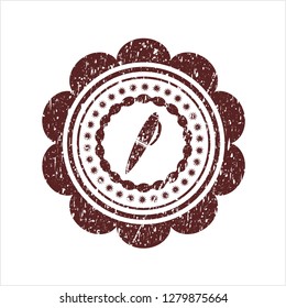 Red pen icon inside distress rubber stamp