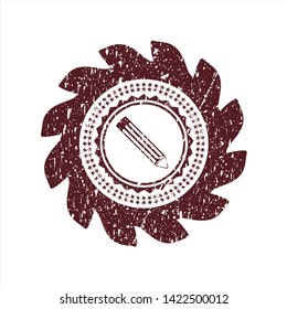 Red pencil icon inside distressed rubber stamp