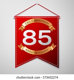 Red pennant with inscription Eighty five Years Anniversary Celebration Design over a grey background. Golden ribbon. Colorful template elements for your birthday party. Vector illustration